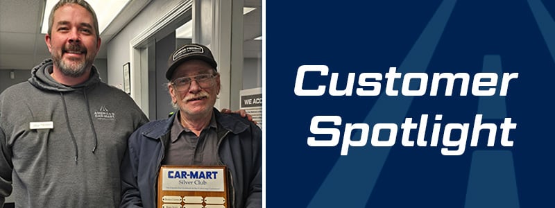 Car-Mart Customer Barry White Holding Silver Club Plaque