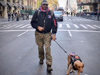 Paired through the Hope for Heroes Canine Companion program, Mychal Watts and Connie explore New York City together. Every step is easier with her by his side.